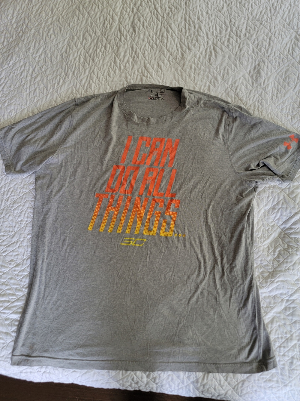 Under Armour Men’s Grey Graphic Tee with Orange-to-Yellow Gradient Text